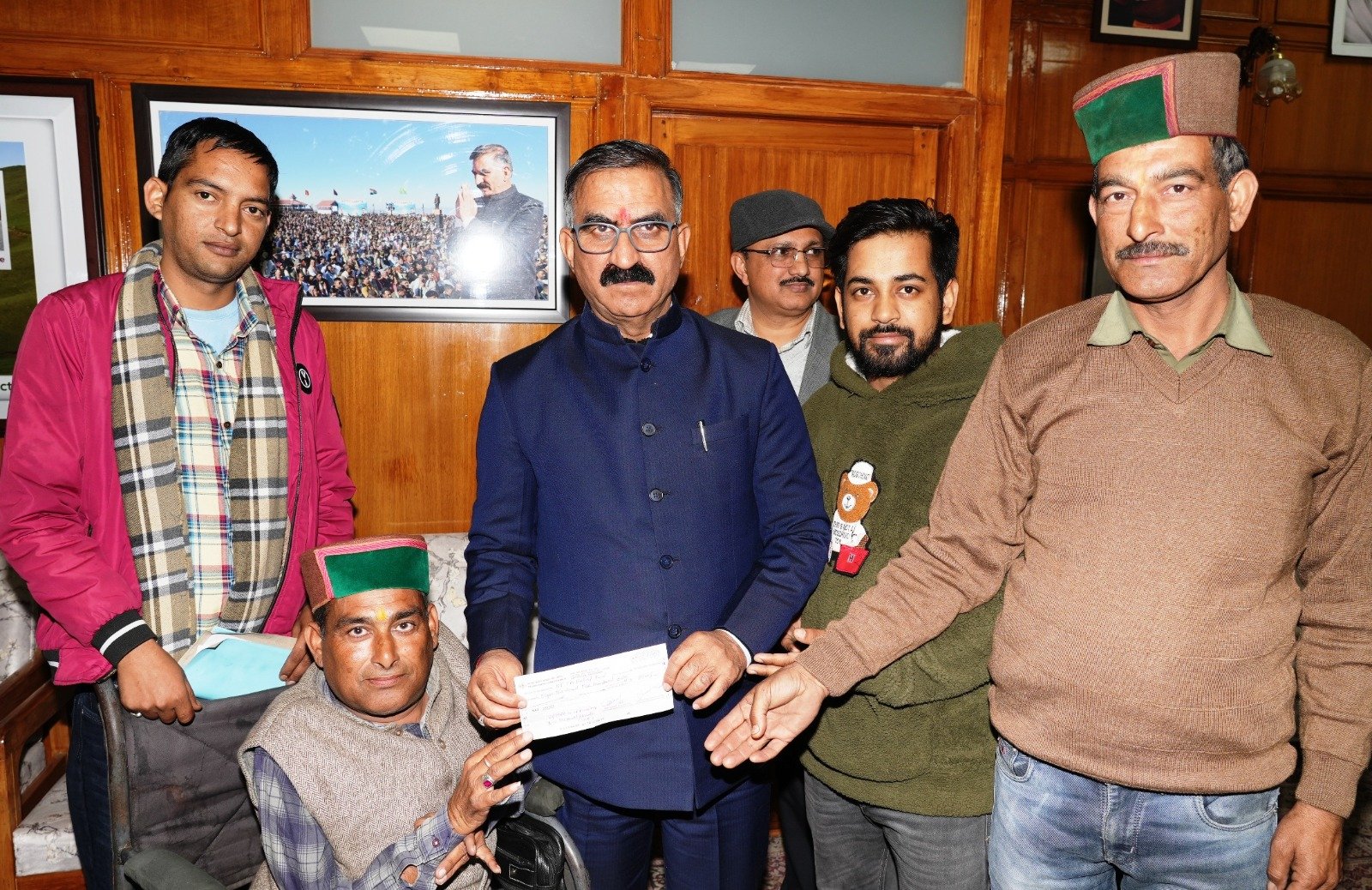 , Pardhan Gram Panchyat Galore Khas of AC Nadaun presents cheque to CM